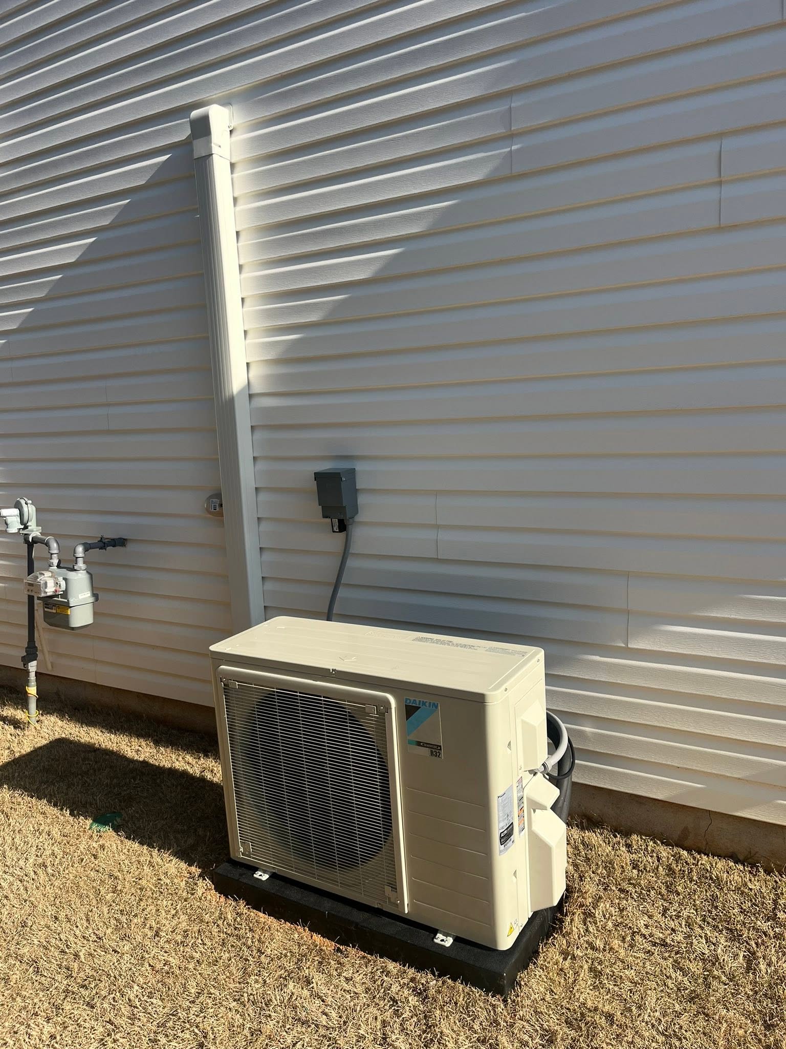 Daikin ductless HVAC outdoor unit installed beside a home in Upstate South Carolina