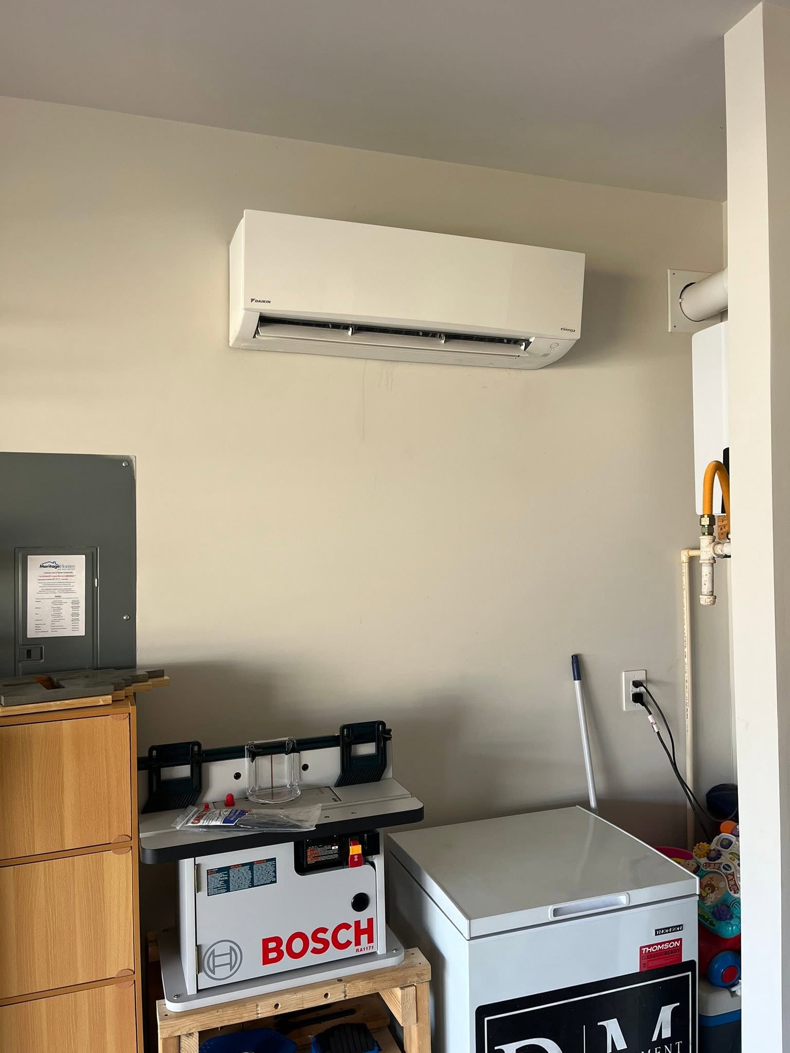 Indoor wall-mounted mini-split unit installed in a garage in Gaffney, SC